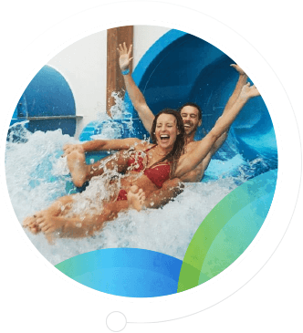 Couple going down a waterslide